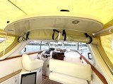 Wheel house with separate rollup closure